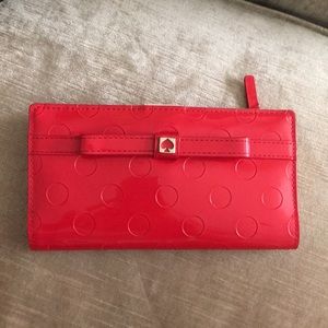 Red Kate Spade polka dot wallet
